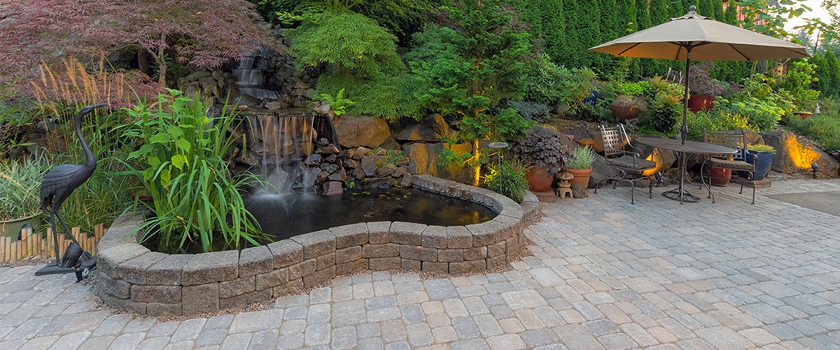 Backyard Landscaping Patio with Waterfall Pond